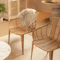Sillón de ratán natural: Estructura de hierro forjado, no requiere montaje, limpiar con paño seco, uso para adultos
